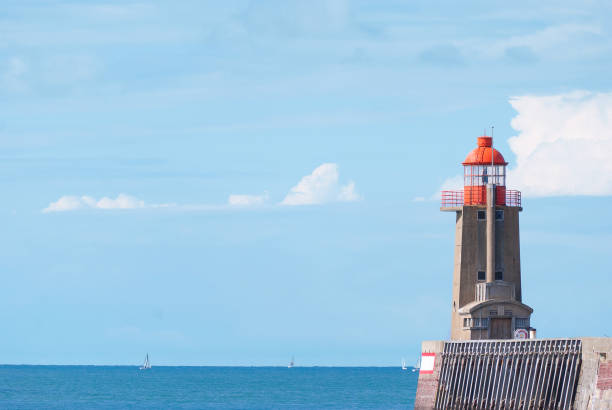 istock Lighthouse with sea scape in sunnny day 865604550