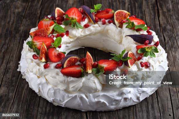 Pavlova Cake Wreath On Table Closeup Stock Photo - Download Image Now - Pavlova - Dessert, Wreath, Cake