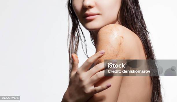 Closeup Of A Womans Shoulder With Scrub Of Coffee Stock Photo - Download Image Now