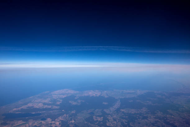 istock High altitude view between sky and space , in to the dark 865608082