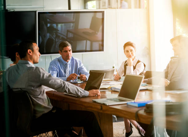 Business people discussing in board room