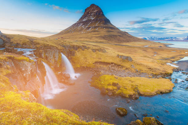 istock Autumn season Kirkjufellsfoss volcano with tropical waterfall 865611614