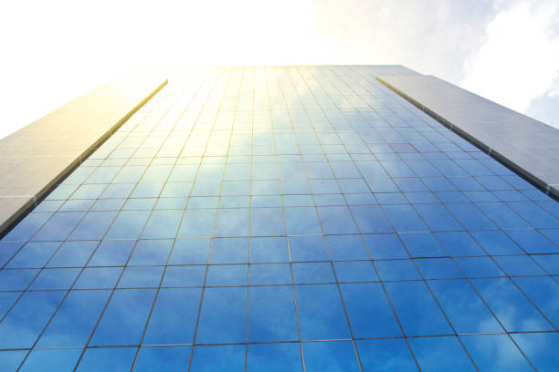 istock modern business reflect cloud and blue sky background 865611714