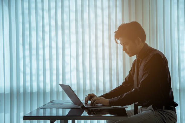 istock Asian businessman is concentrating on his work. 865612802