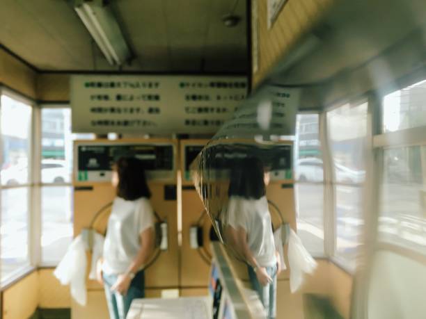 Woman waiting in laundromat