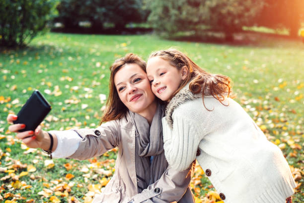 istock Happy family taking selfie 865615942