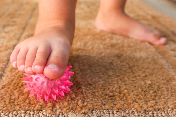 istock Children does exercise for foot massage ball 865619832