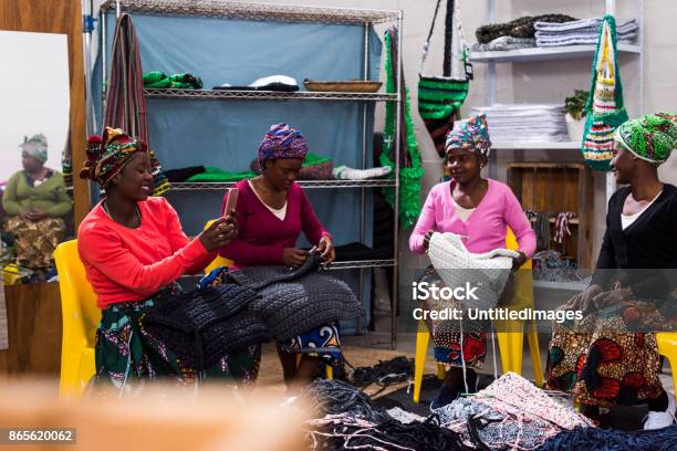 Women At Work Knitting And Having Fun Stock Photo - Download Image Now - Business, Owner, 30-39 Years