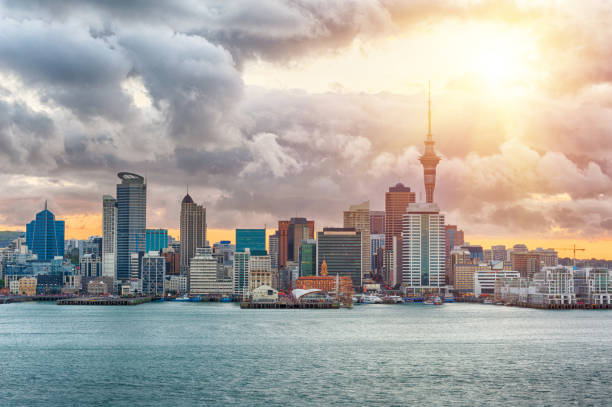 Auckland skyline Skyline photo of the biggest city in the New Zealand, Auckland. The photo was taken during the golden sunset across the bay Waitemata Harbor stock pictures, royalty-free photos & images