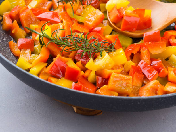 istock Cooking bell peppers with rosemary 865624294