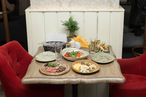 istock table with food in cafe or restaurant 865627674