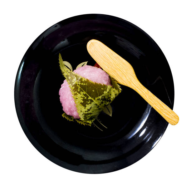 Mochi cake japanese gourmet style Mochi cake japanese gourmet style on black plate and white background mochi cherry blossom cake stock pictures, royalty-free photos & images