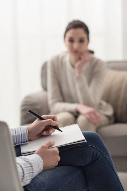 istock Psychologist listening to her patient 865631310