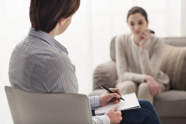 istock Psychologist listening to her patient 865631464