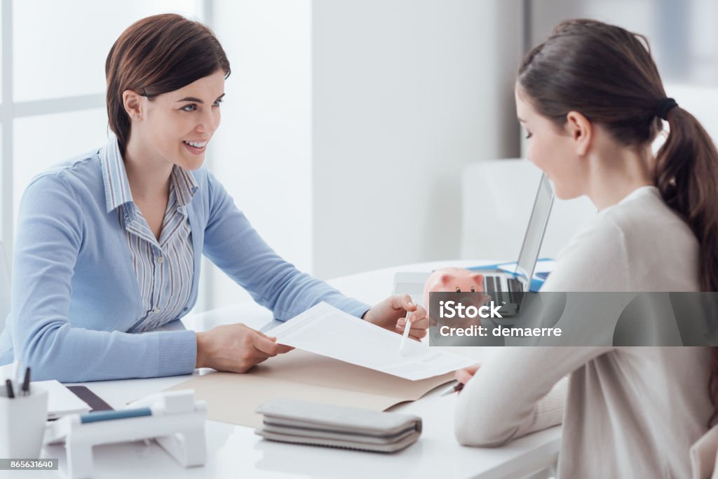 Financial planning Business consultant and customer meeting in the office, the businesswoman is holding a contract and pointing Privacy Stock Photo