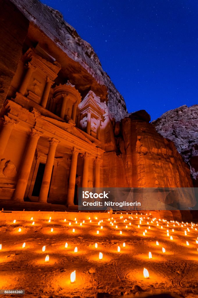 Petra by Night The Treasury of the mystic Petra City at Night in Jordan Petra - Jordan Stock Photo