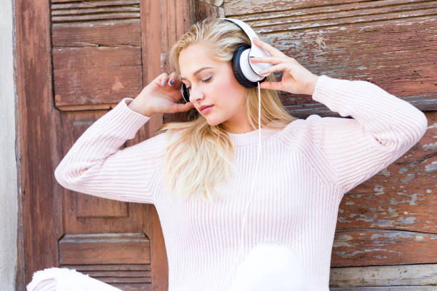 istock Girl enjoying the music 865644932