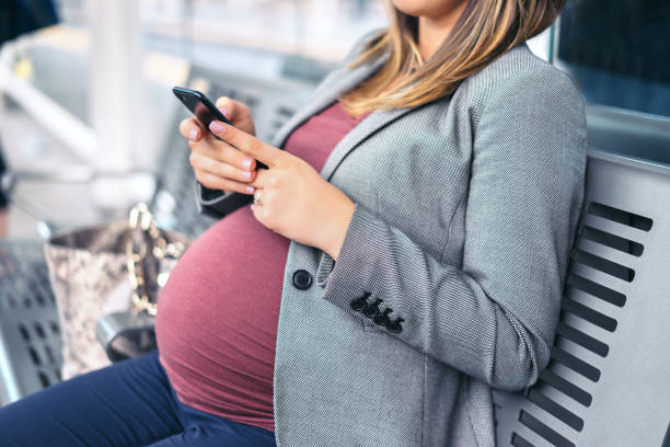 Woman commuting during pregnancy