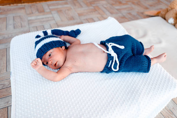istock 3 month old baby in the bed 865652264