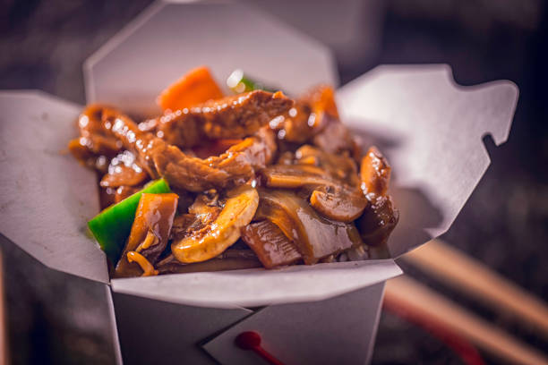 Spicy Kung Pao Chicken Served as Take Out Food