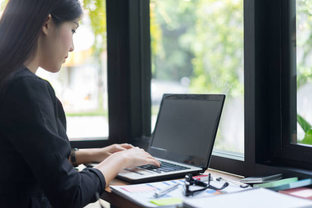 istock modern business woman working with laptop in office 865656862
