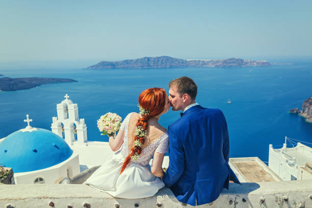 Wedding couple watching the sea