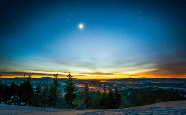 istock Night moon in the snowy mountains 865659668