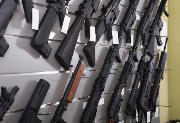 istock air-driven rifle   hangs on the wall in  army store 865659852