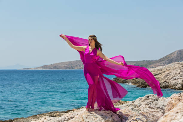 istock Young woman goes in the sea 865664770