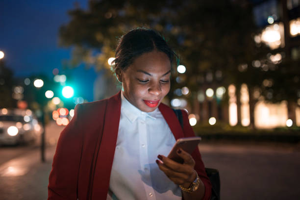 istock Businesswoman holding mobile phone 865667586