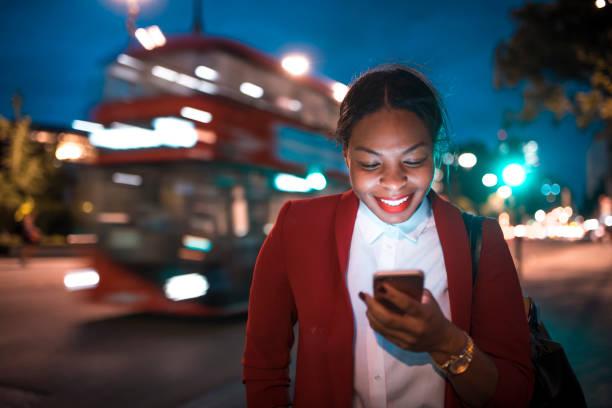 istock Businesswoman holding mobile phone 865667594