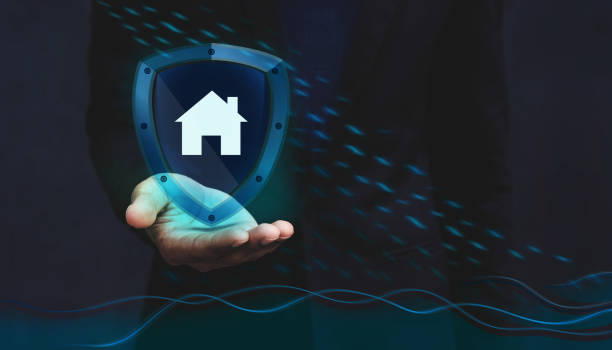 istock Concept For Insurance Company to Safe and Supporting Customer, House icon inside a Shield Guard to Protected them from Rain and Flood over a Businessman Hand 865668262