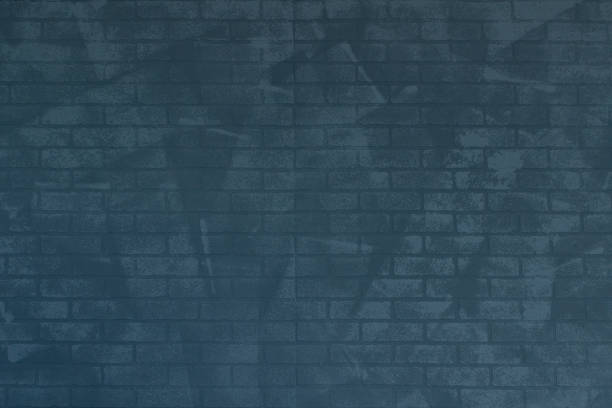 istock background of blue toned brick wall texture 865673280