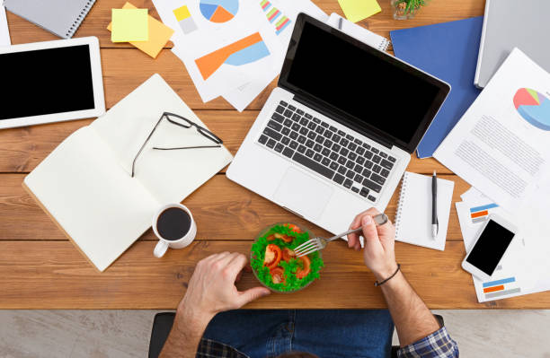 istock Busy working man in modern office, top view 865673490