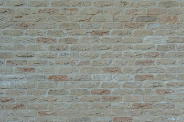 istock Background of old vintage white brick wall texture 865676026
