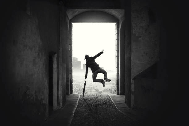 happy man jumping happy despite the bad weather