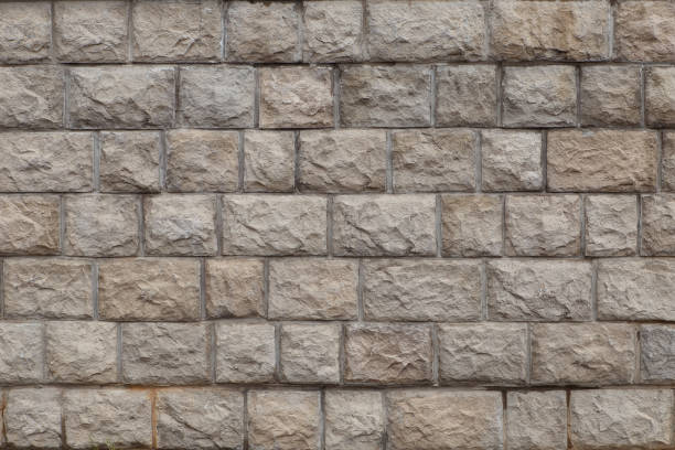 istock gray background of stone brick wall texture photo 865679950