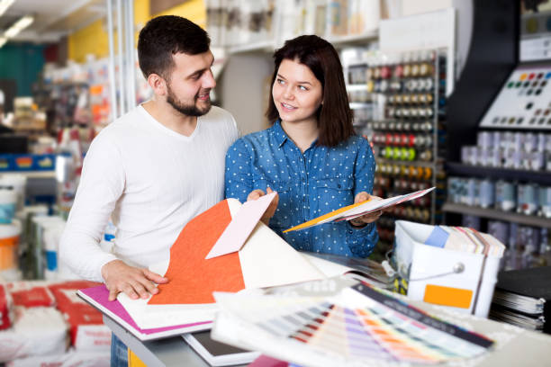 istock Couple examining color scheme variants 865680260