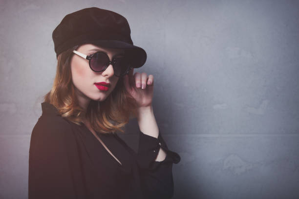 istock Style redhead girl in black hat and clothes 865680828