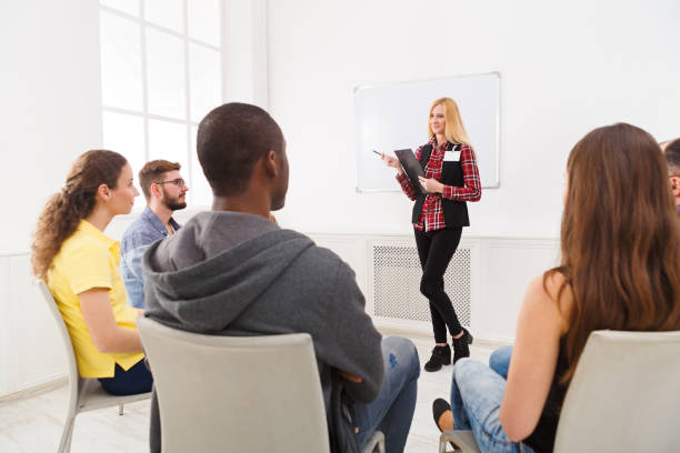 istock Blonde woman doing presentation in office 865680848