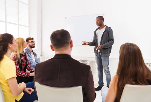 istock African-american man doing presentation in office 865680996