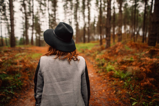 istock Young woman at forest in autumn 865684920
