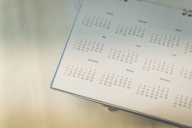 istock Blurred calendar planning concept in dark tone. 865687896