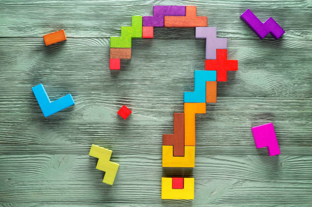 istock Question mark made of colorful wooden blocks. 865691838