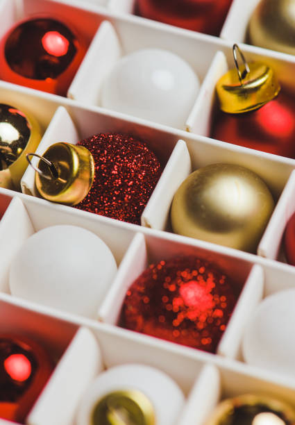 istock Christmas tree decorations red golden bauble ornaments 865693568