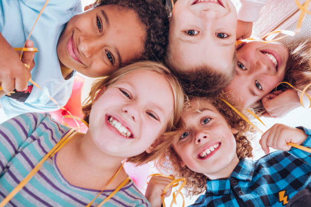 istock Group of smiling children 865700560