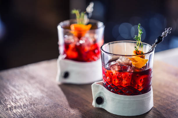 istock Fresh cocktail drink with ice fruit and herb decoration. Alcoholic, non-alcoholic drink-beverage at the bar counter in the pub restaurant  or night club 865704564
