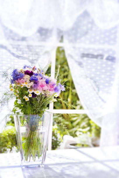 istock Flower bouquet in glass vase 865705348