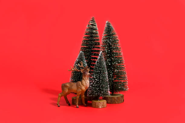 istock forest firs and reindeer red 865709850