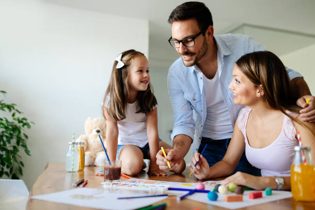 istock Happy familiy spending fun time at home 865710614
